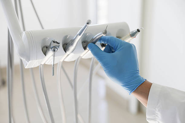Professional Tooth Extraction technician working in Williamsville, IL